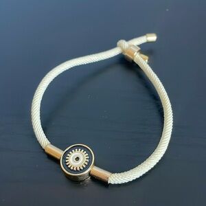 🆕 Cream color pully-tie bracelet with evil eye charm